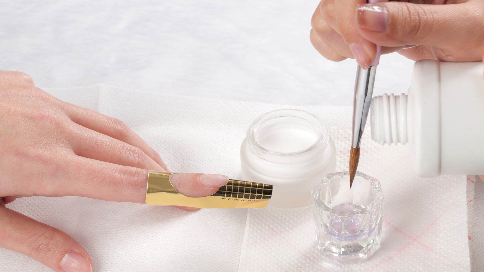 Push cuticles back to help bond natural nails.