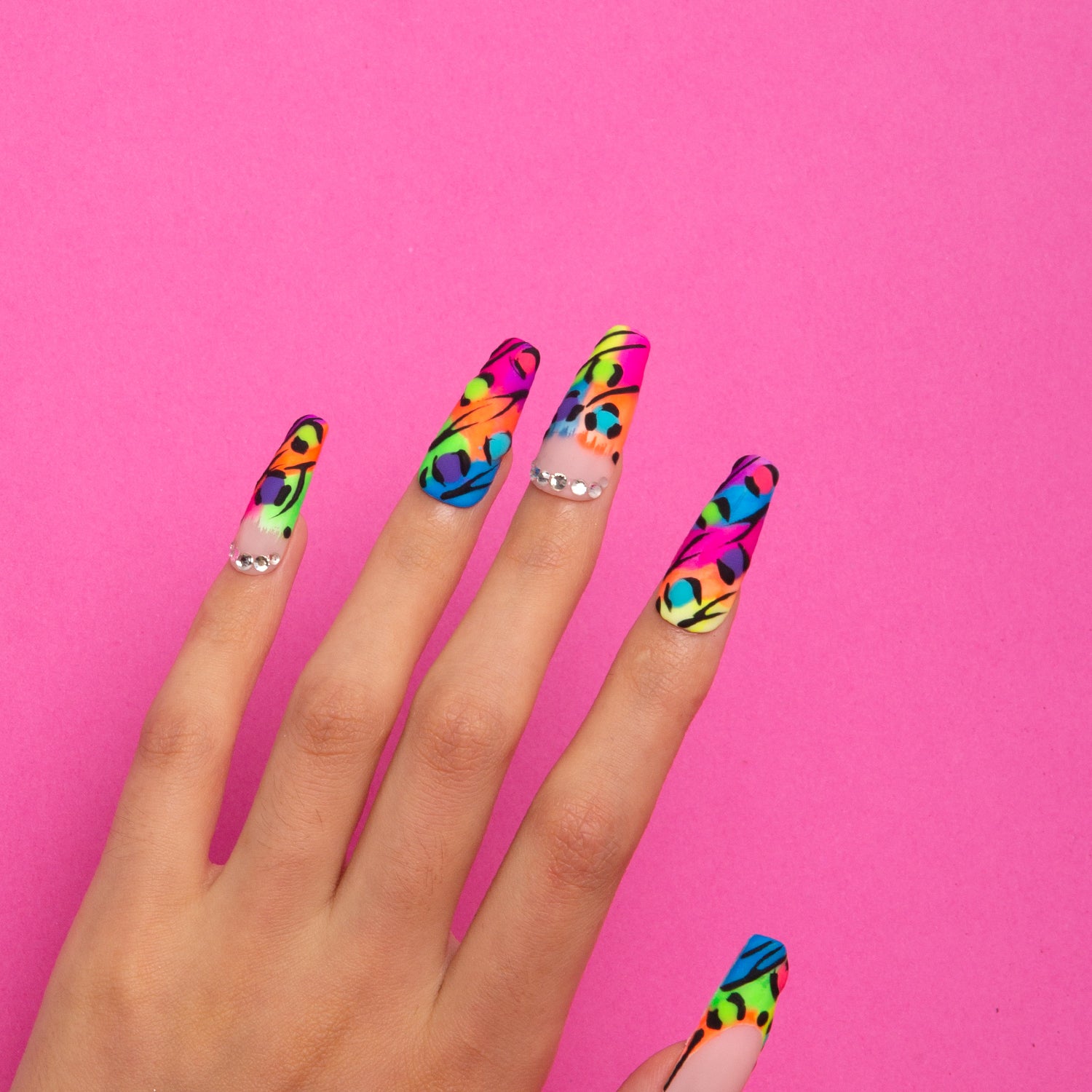 Colorful leopard print coffin nails, perfect for girls' night out.