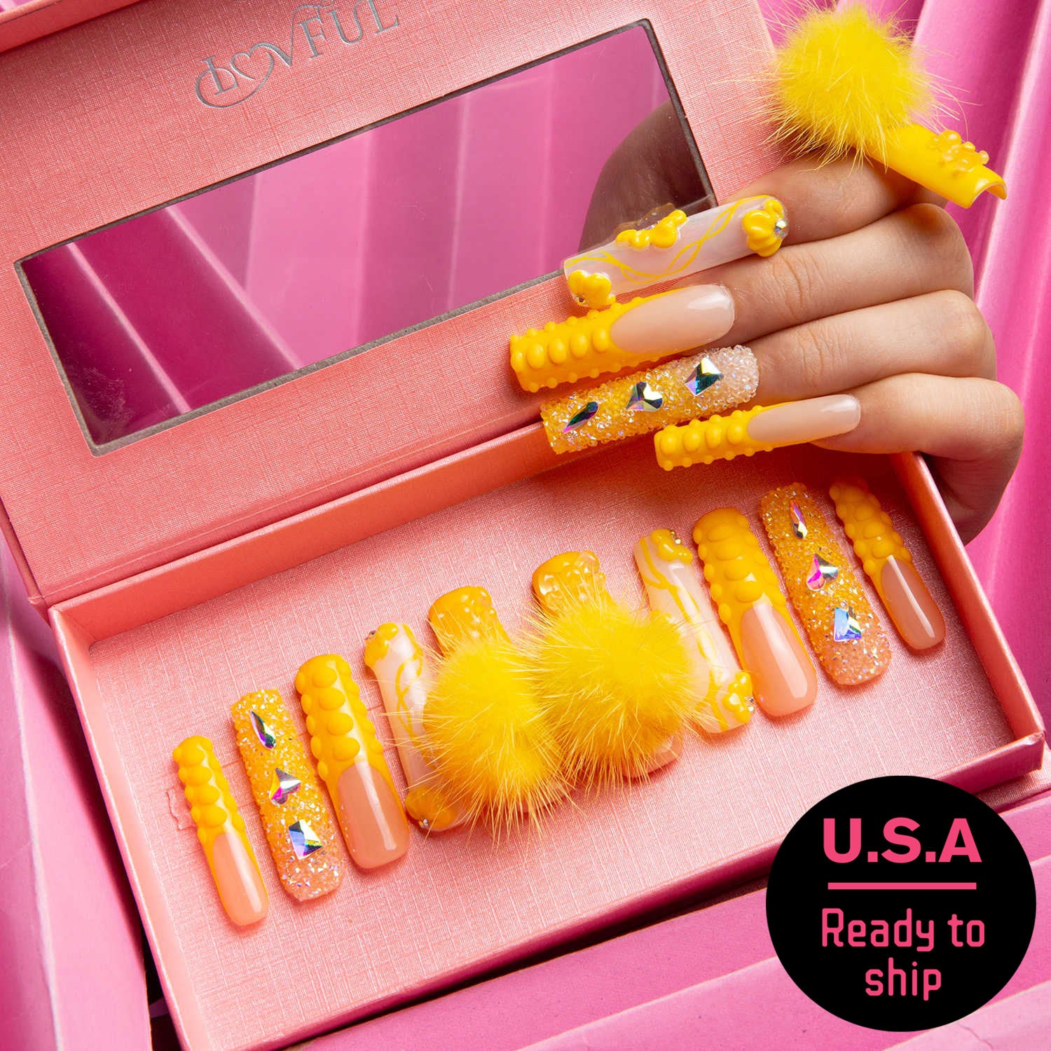 Lovful's 'Yummy' press-on nail set in sunny yellow with glitter accents and detachable fluffy yellow balls, ready to ship from U.S.A.