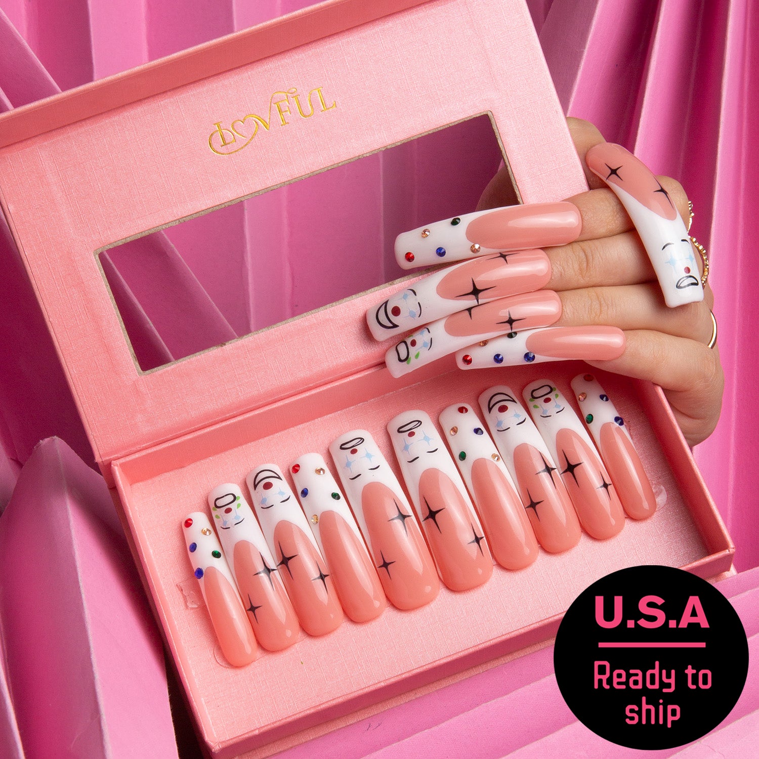Circus clown-themed press-on acrylic nails with clown faces, crosses, and colored dots, displayed in a pink Lovful box. U.S.A. ready to ship.