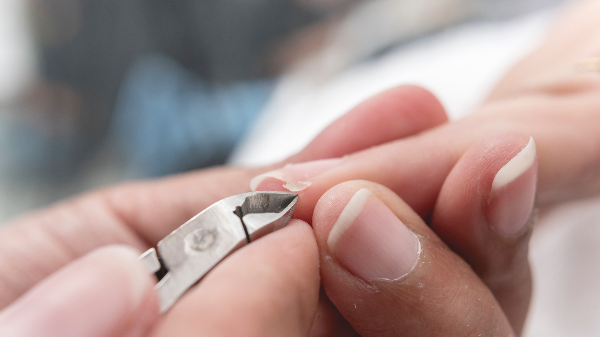 Cut hanging skin using nail clippers