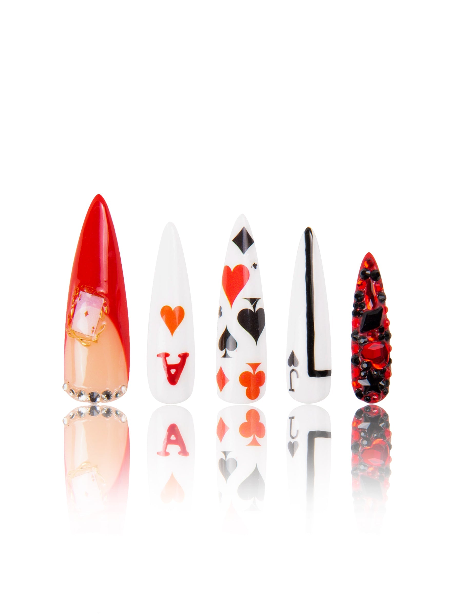 Set of stiletto-shaped press-on nails from the 'Poker Queen' collection featuring card game-inspired designs including hearts, spades, diamonds, clubs, and red and black rhinestones.