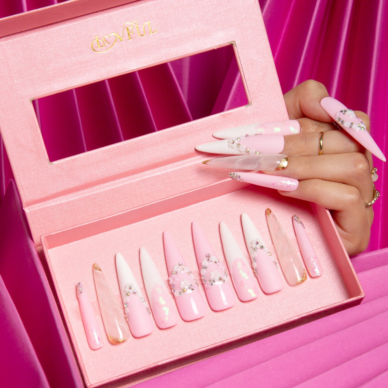 Lovful's Sweet Dream stiletto press-on nails in light pink with French tips and heart-shaped flower ring designs, ideal for weddings and bridal wear.