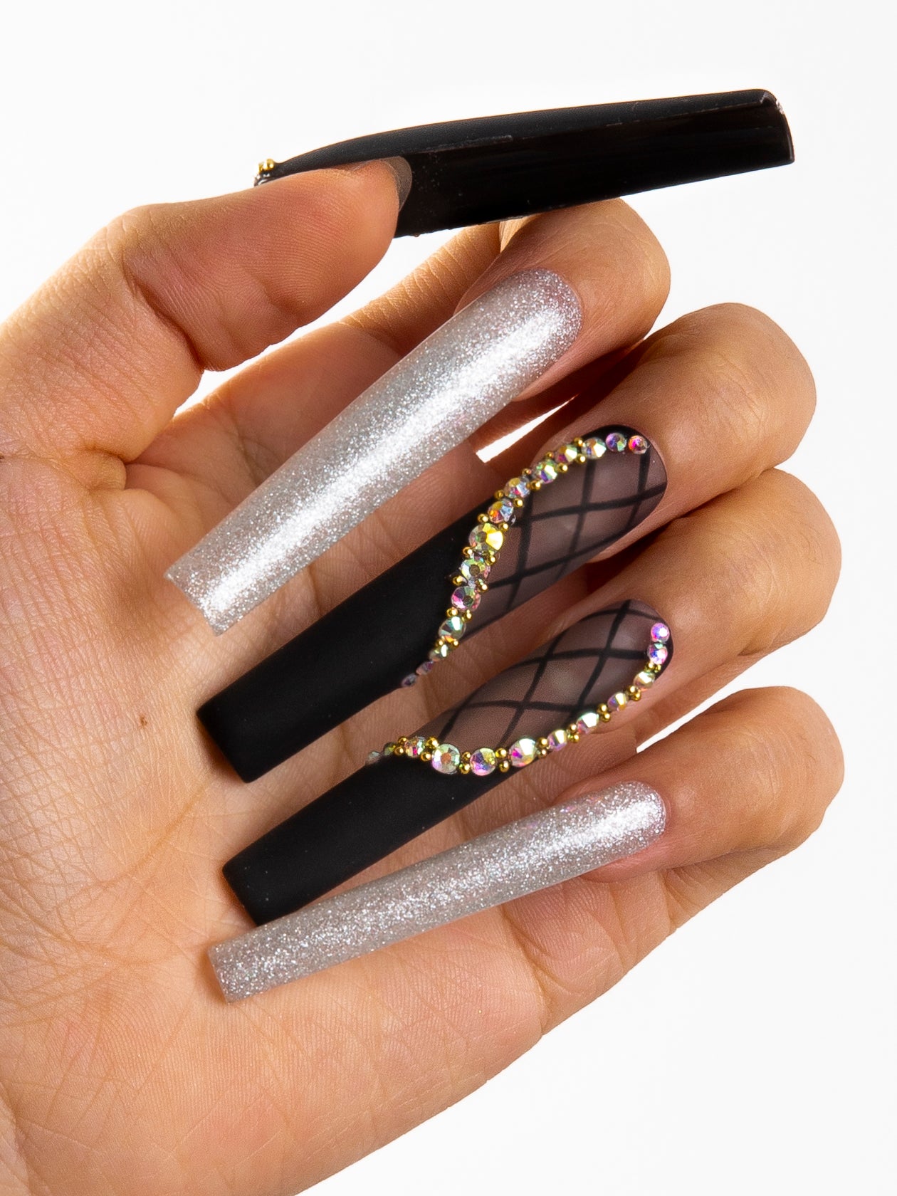 Black Lace press-on nails with silver shimmer and lace decor, featuring rhinestone accents for a sophisticated and elegant look.