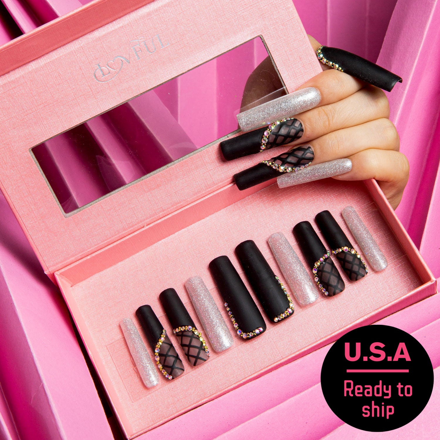 Square black matte press-on nails with lace patterns, silver glitter accents, and rhinestones displayed in a pink box. 'U.S.A Ready to ship' noted on the box.