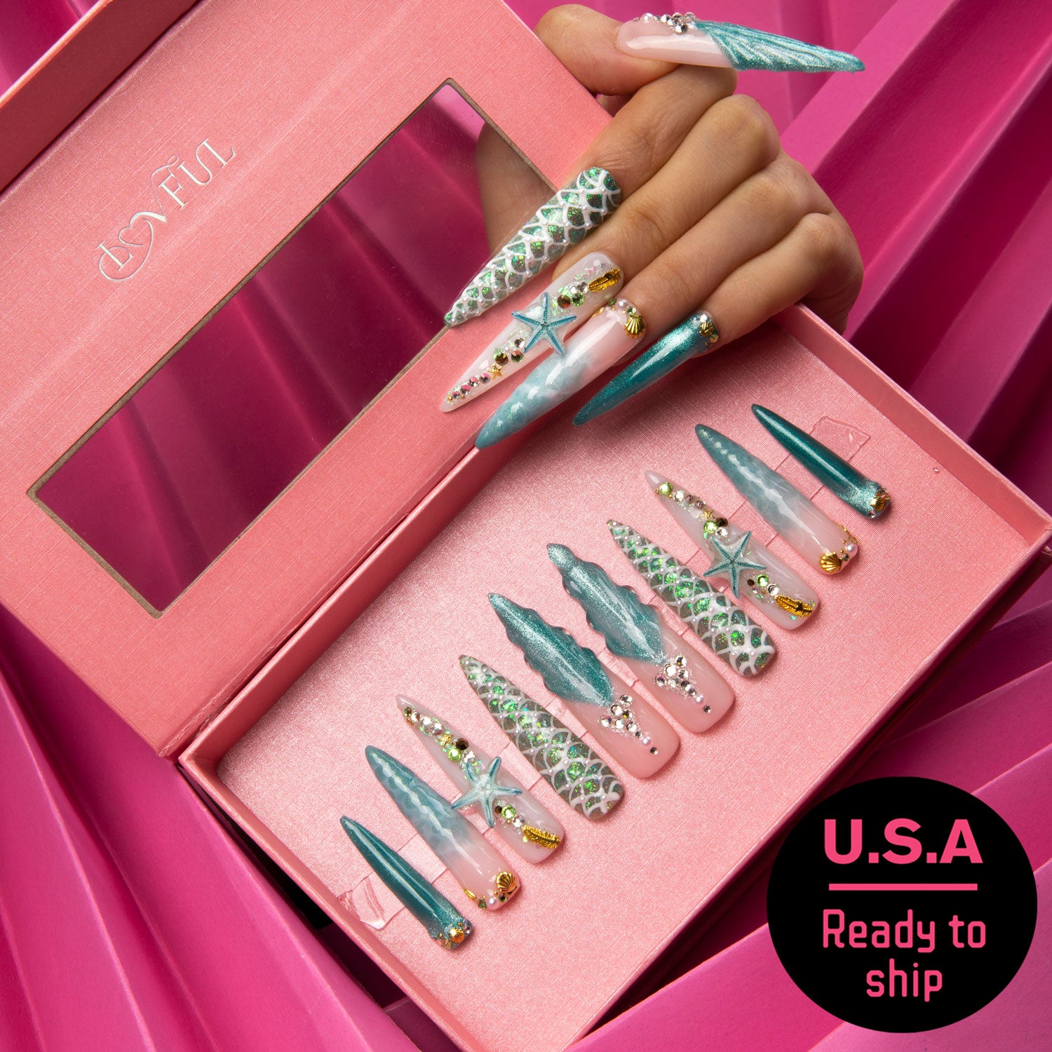 'Surfing Girls' stiletto press-on nails with Hawaii sea blue base color, starfish and glitter decorations, neatly displayed in a pink box. U.S.A Ready to ship.