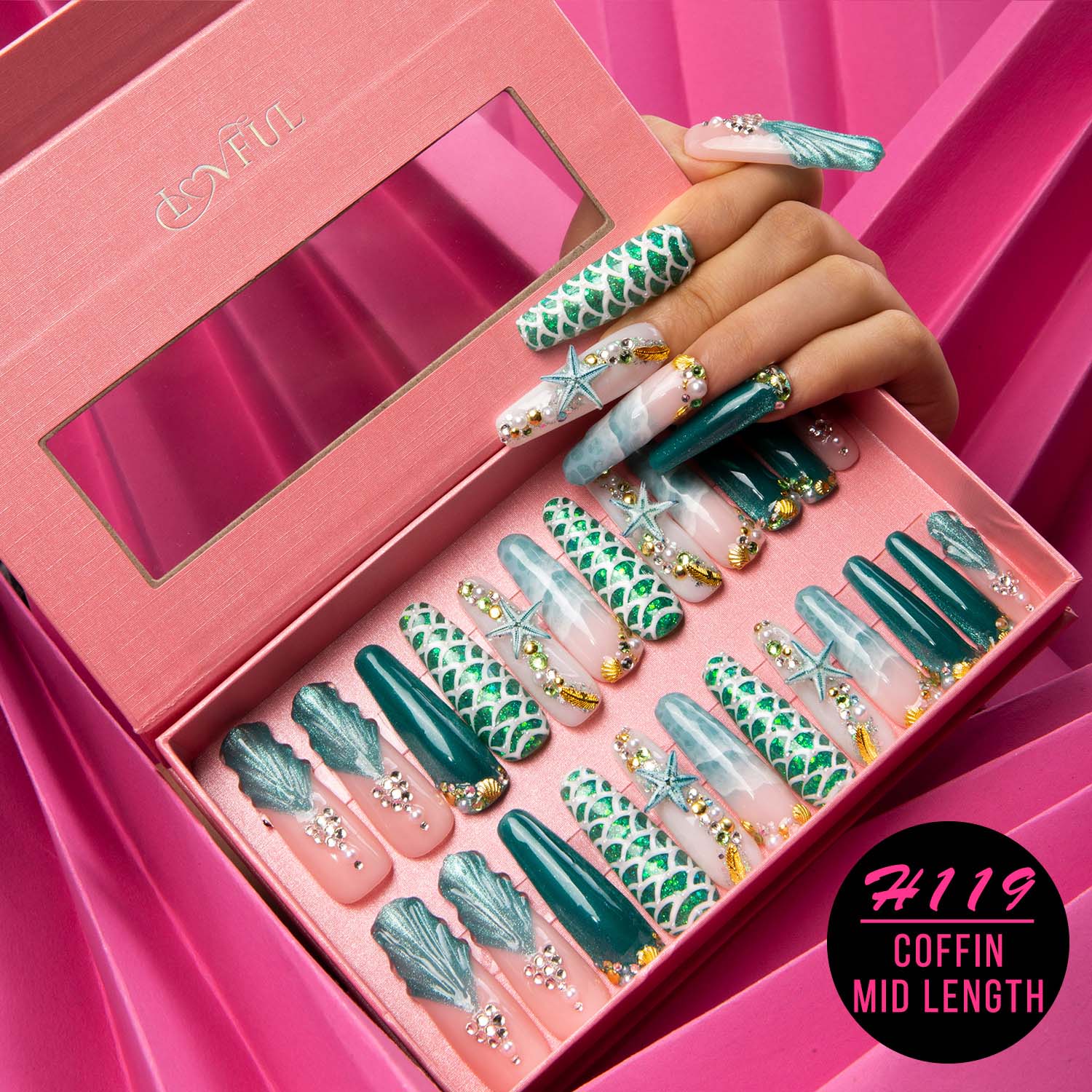 H119 - Surfing Girls press-on nails set with a Hawaii sea blue base color, starfish and glitter decorations in a pink box. Coffin-shaped, mid-length design.