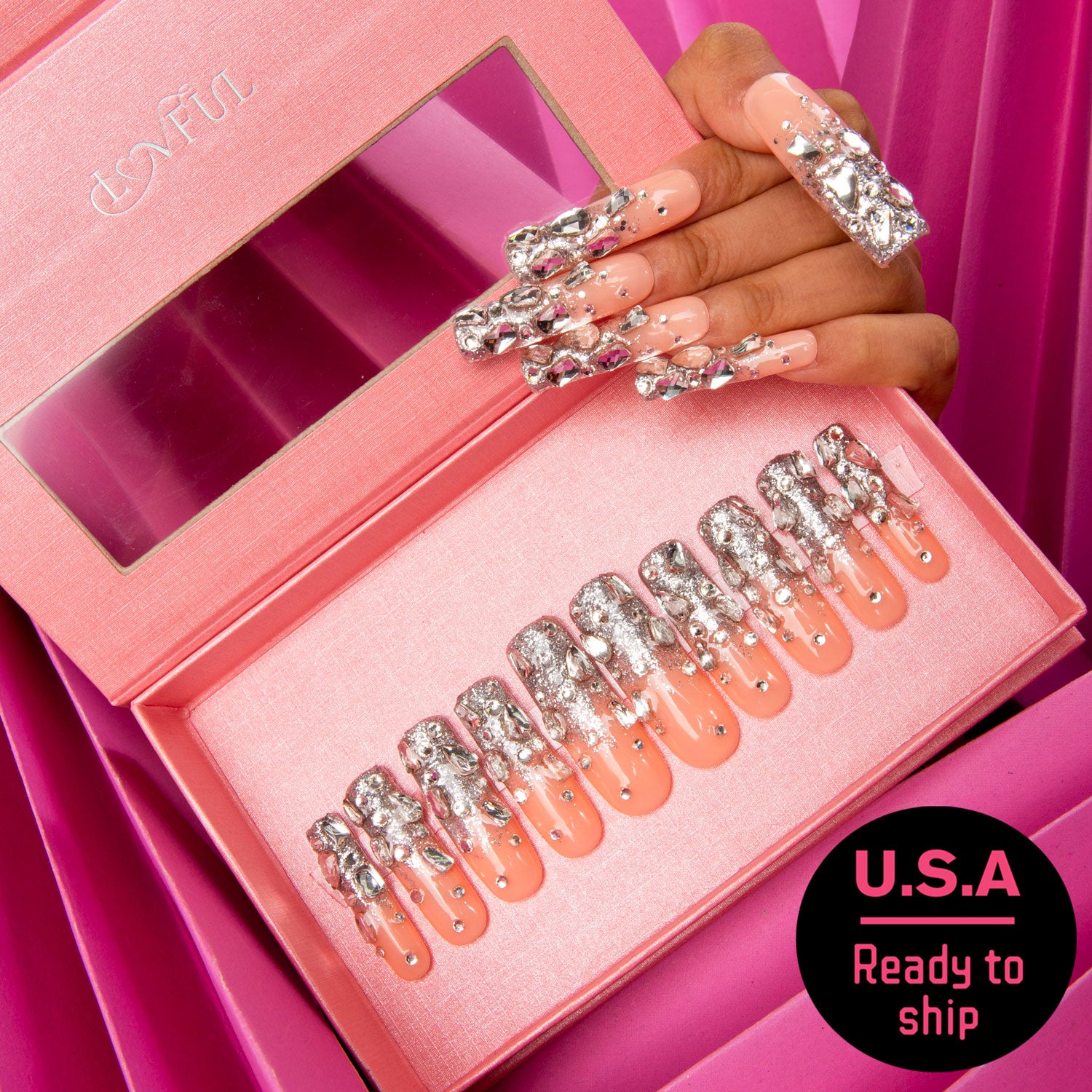 Set of Silver Wind press-on nails with silver glitter and rhinestones in a pink box, U.S.A. ready to ship