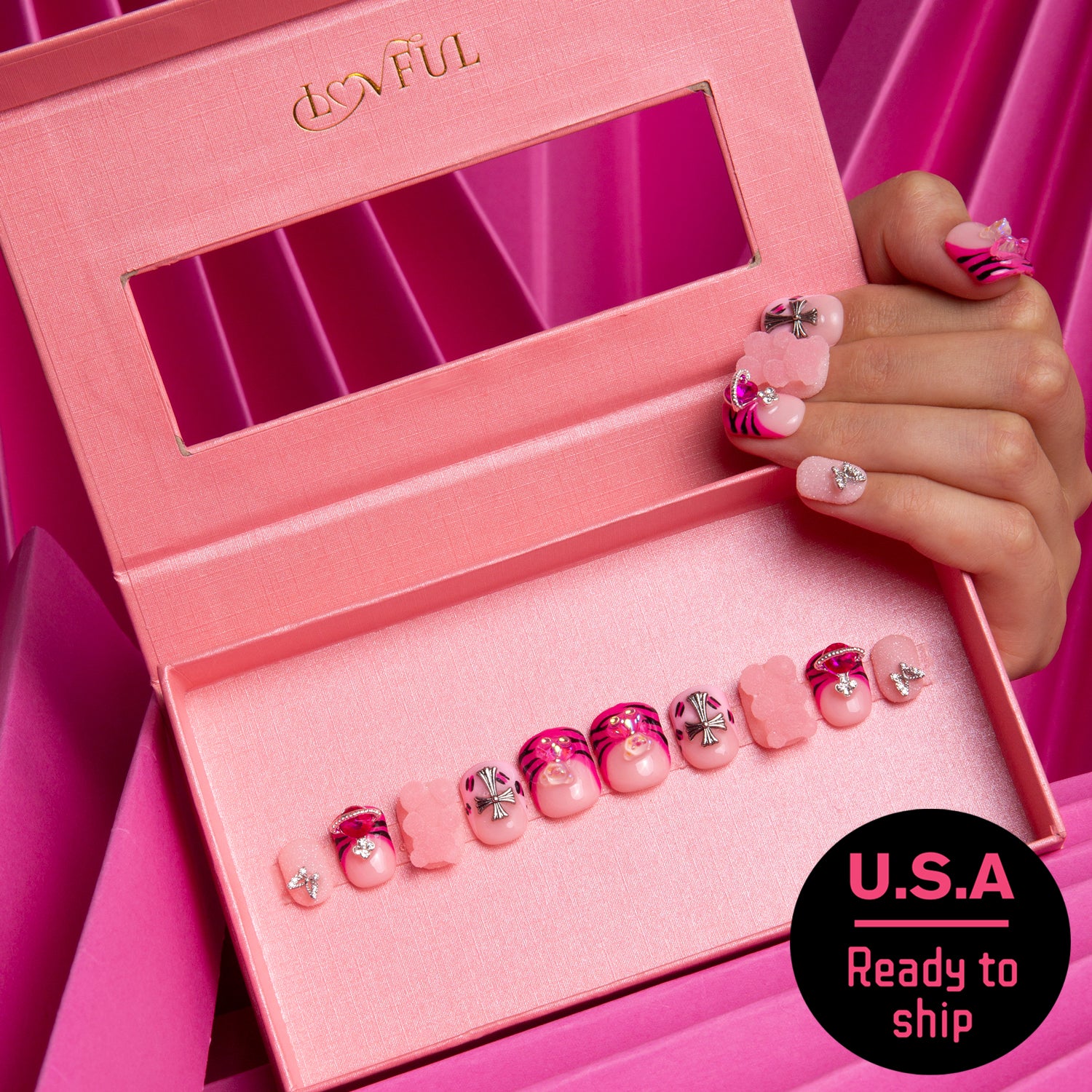 Safari Love press-on nails by Lovful in a pink box. Nails feature hot pink French tips, leopard prints, lips, butterflies, and accents. U.S.A Ready to ship.