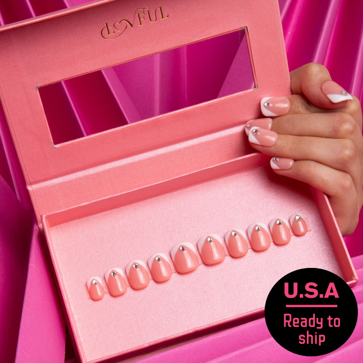 Pink box showcasing 'Eternal Polaris' press-on nails by Lovful, featuring white triangle French tips with rhinestones, with an overlay sticker that says 'U.S.A Ready to ship'.