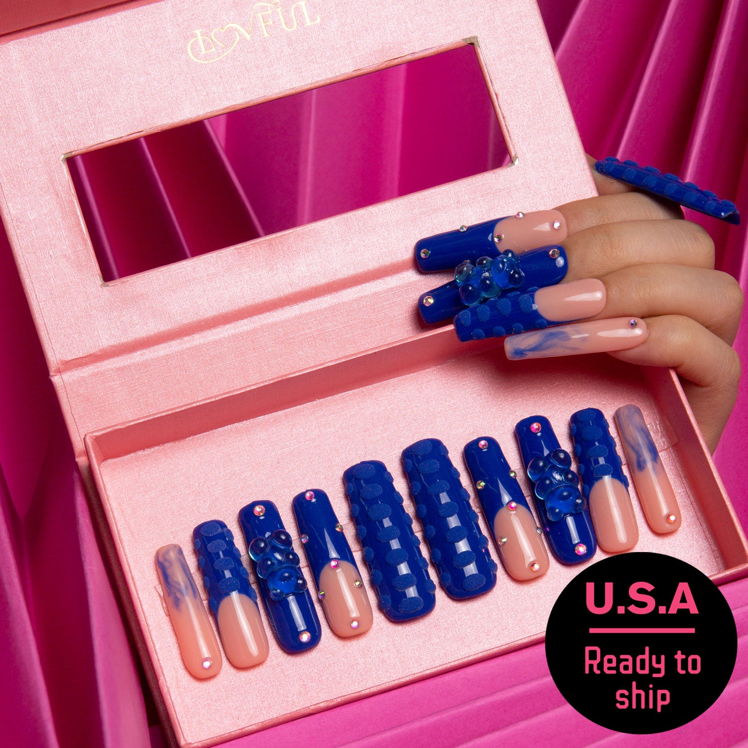 Lovful Little Blue Bear Rhinestone French tip press-on nails set in an open pink box, featuring blue gummy bears, rhinestones, and 3D dots. 'U.S.A Ready to Ship' indicated on the image.