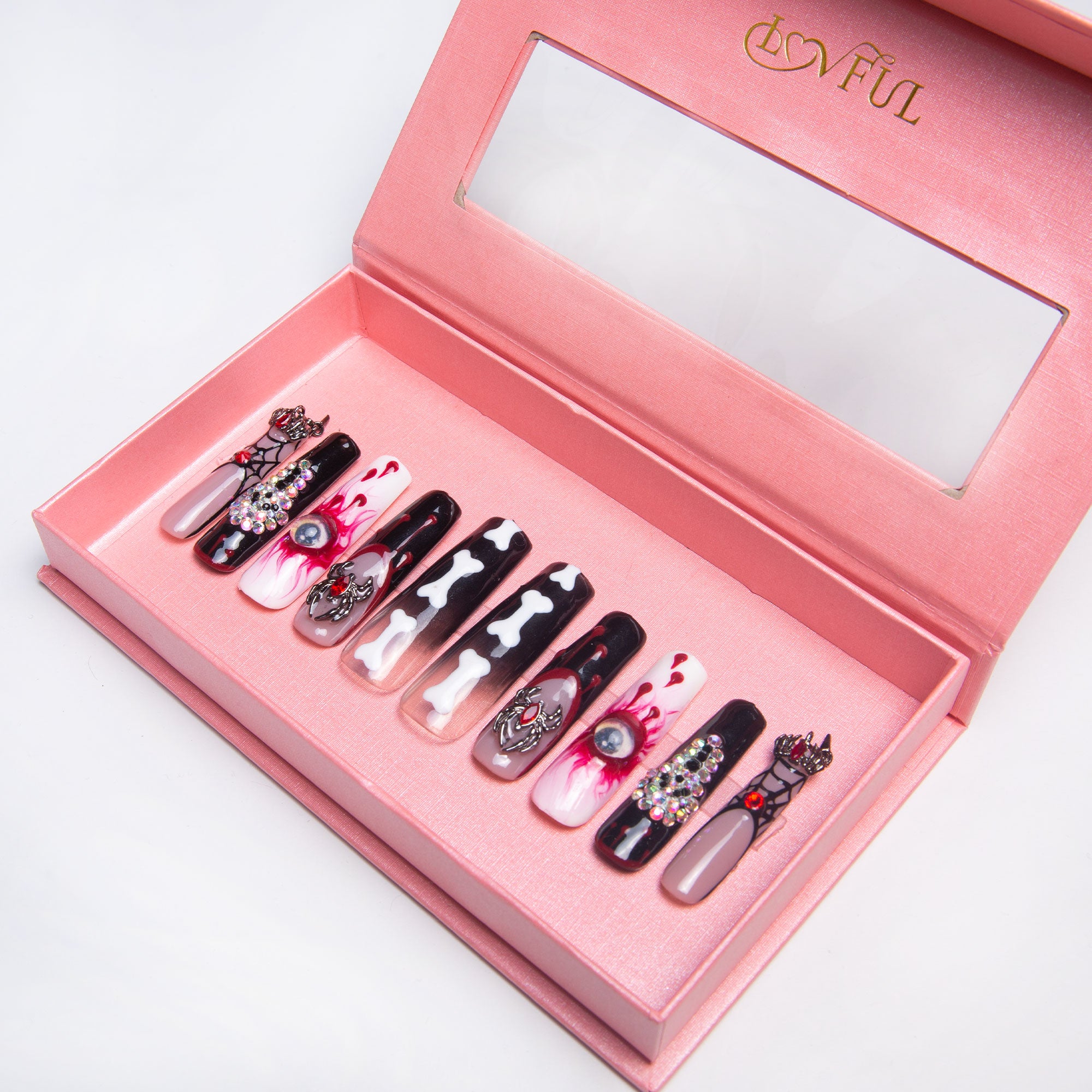 Final Destination press-on nails in pink box