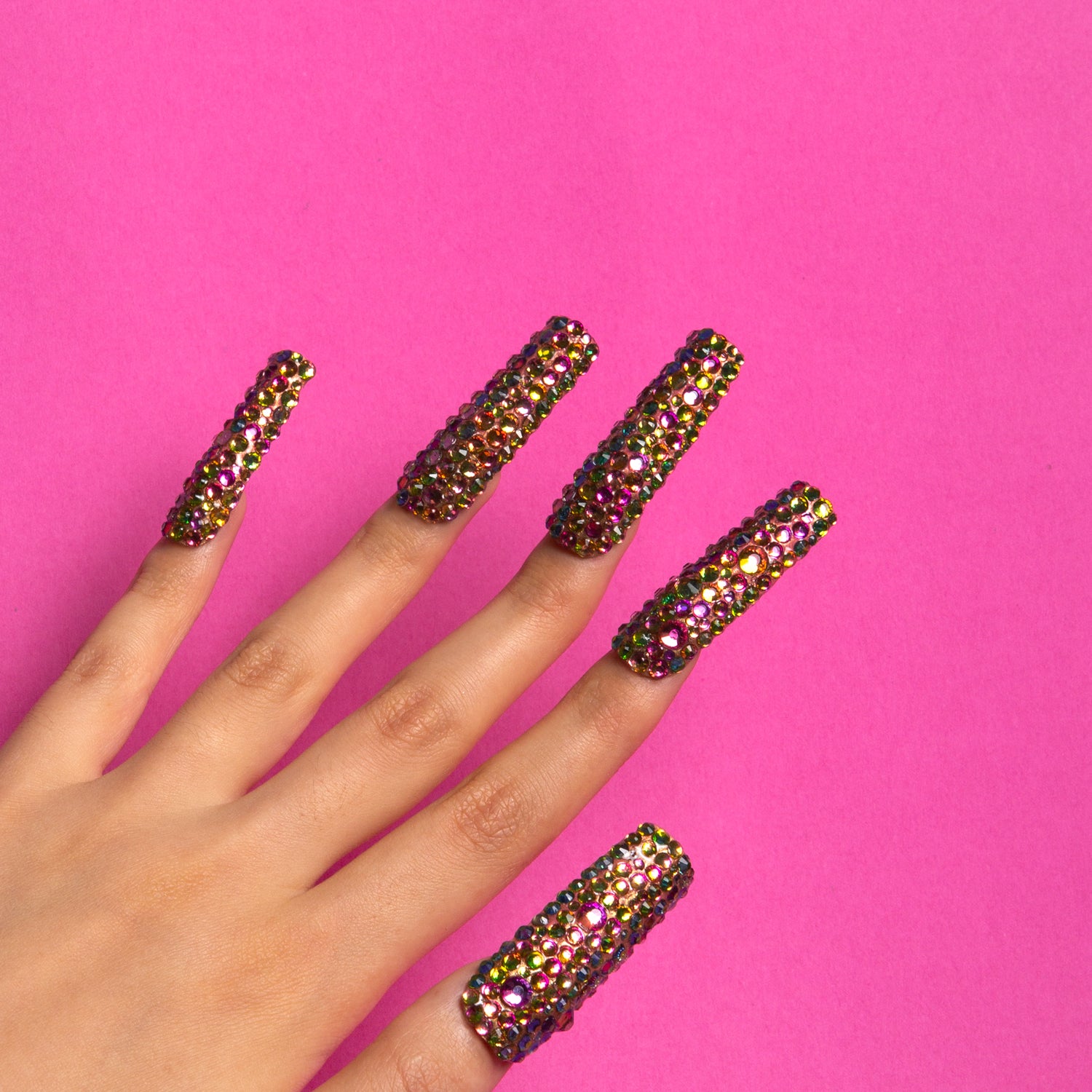 Classic Rhinestone Press-On Nails are covered in glitter, making your hands look great.