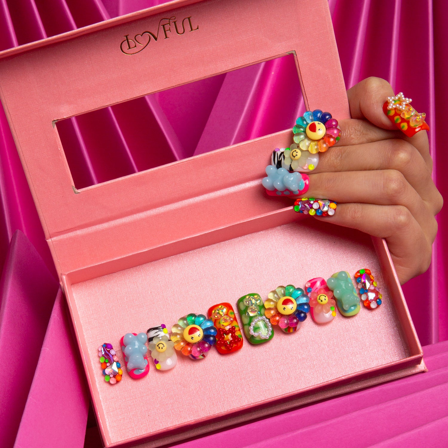 Lovkashi Blossom press-on nails adorned with a happy smiley face design
