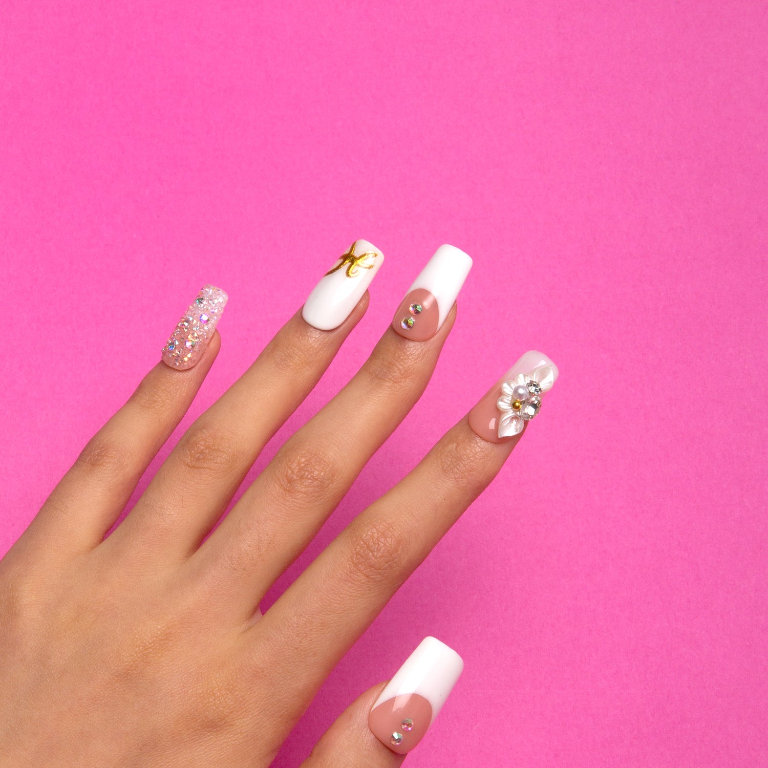 Only You press-on nails feature a classic white French tip design with flowers, adding romance to your fingertips.